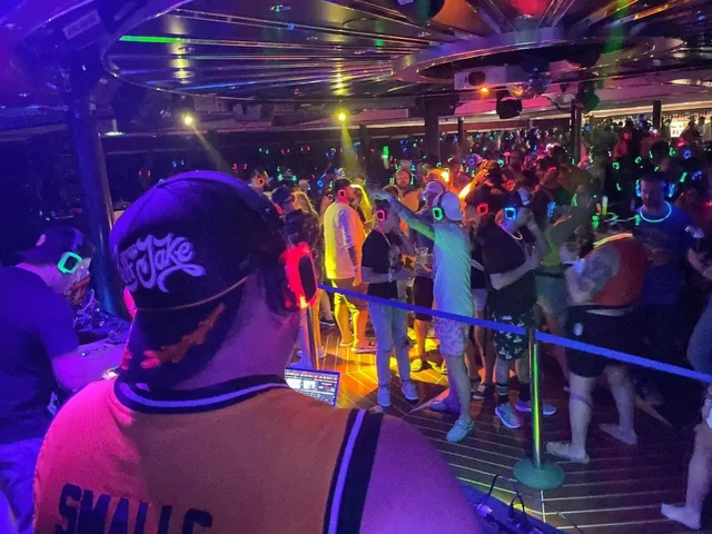 The view from behind CHIEF at the decks during a silent disco at sea